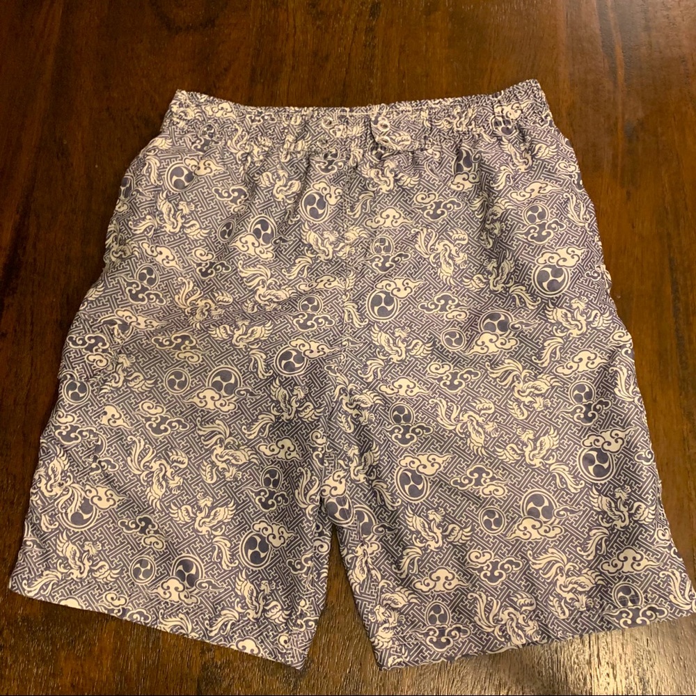 Disney’s Yak & Yets Swim Trunks